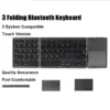 Foldable Bluetooth keyboard connected to tablet