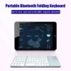 Portable wireless mini keyboard open with touchpad